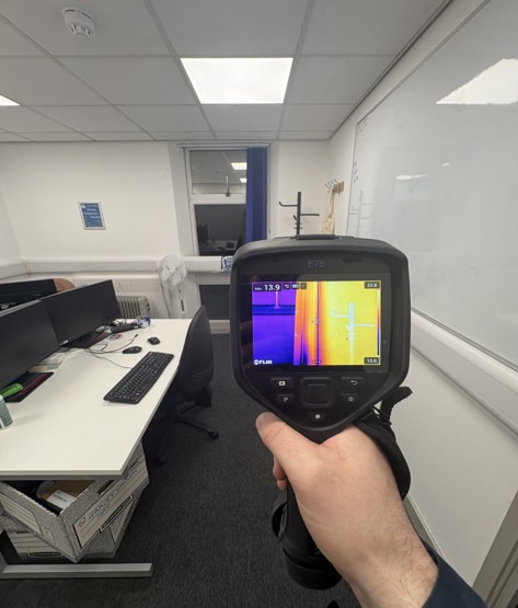 Aerial thermal image of Bridgnorth Police Station showing heat loss through windows and the building envelope, captured by drone-mounted radiometric camera