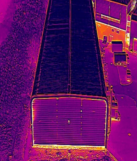 Aerial drone thermal image of the Glasgow Museums Resource Centre storage buildings, showing the heat signature of the roof and elevations